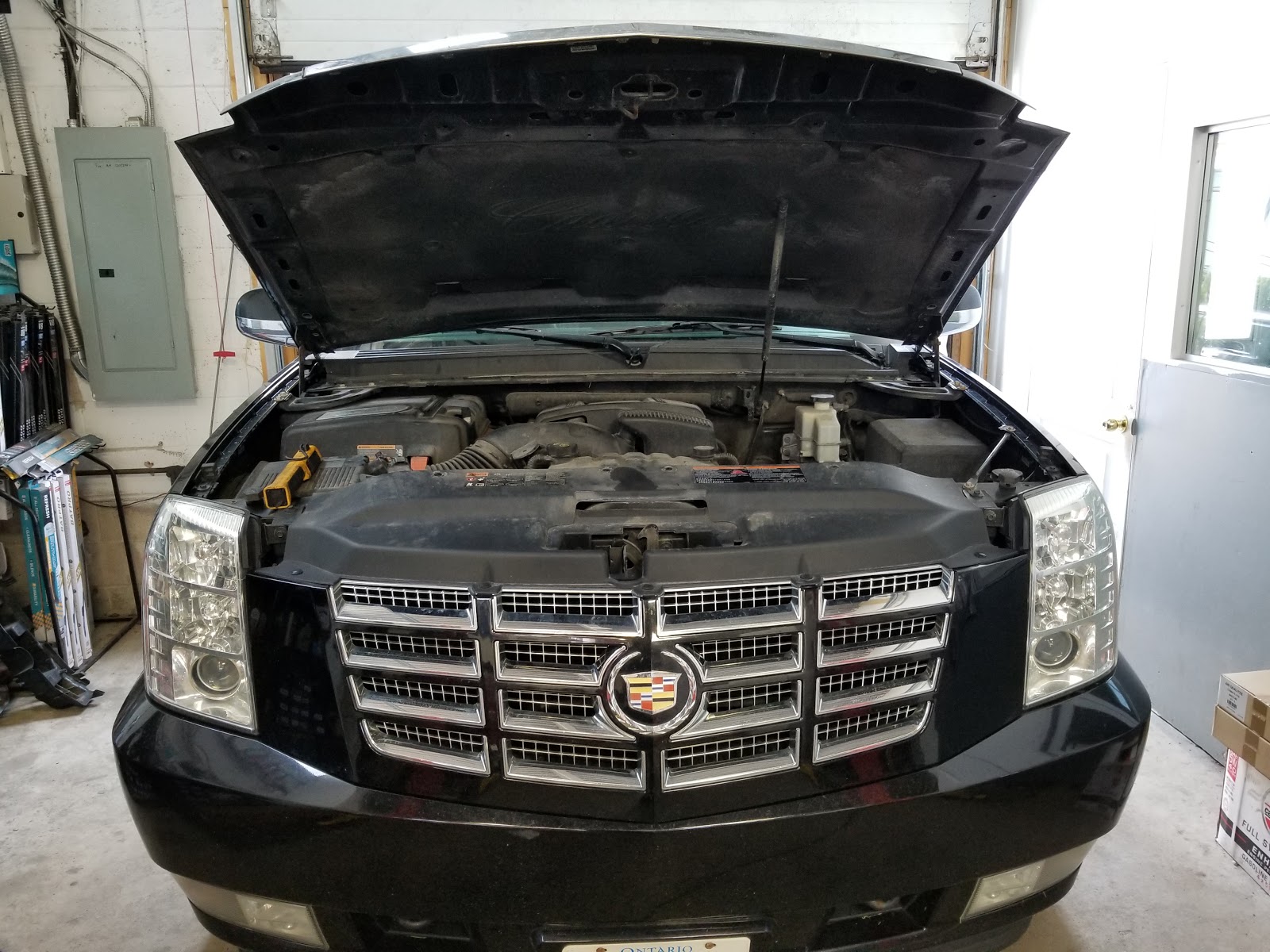 Open hood inside the H & S Automotives bay